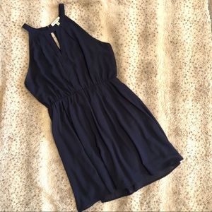 Sleeveless Navy Blue dress.